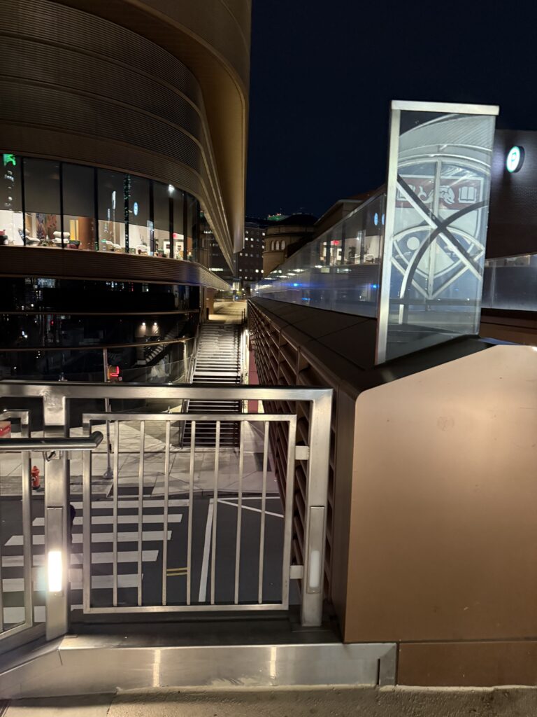 A view of the bridge across the road at Penn Medicine Station, in the dark 
